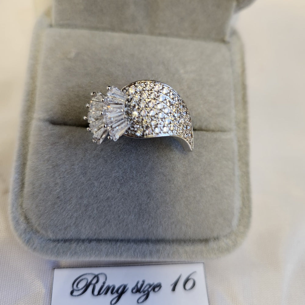 Detailed view of Stunning silver frame ring adorned with clear stones