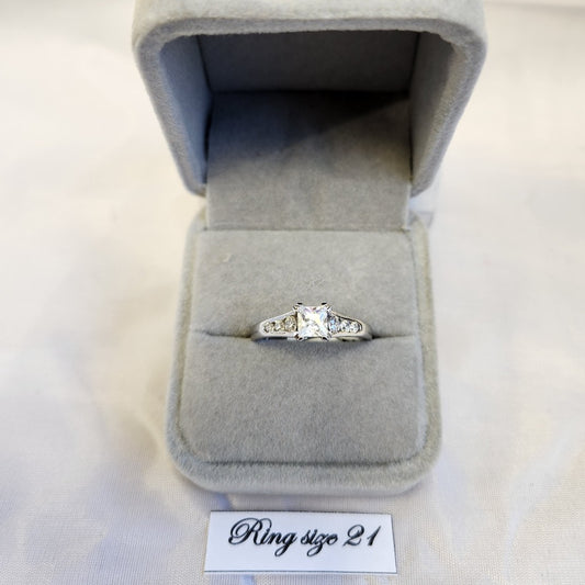 Princess shape ring with stone studded shoulder