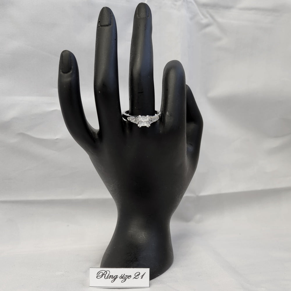 Princess shape ring on a mannequin hand
