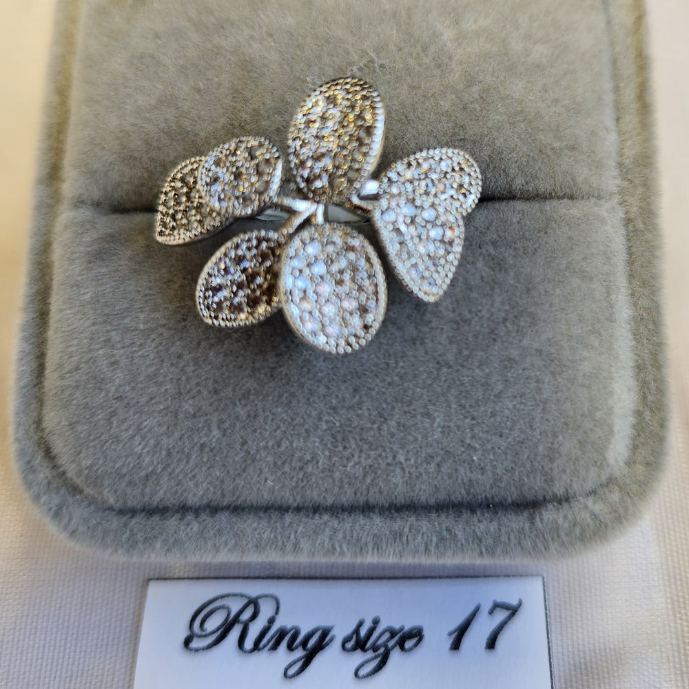 Detailed view of Silver color floral ring with fine cubic zirconia