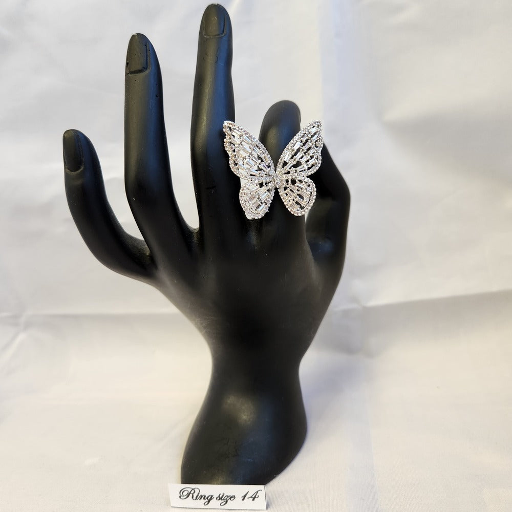 Stunning butterfly shaped ring displayed on a mannequin stand