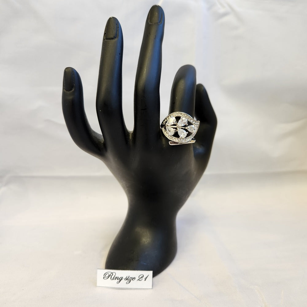 Bold silver color naturalistic style ring displayed on mannequin stand