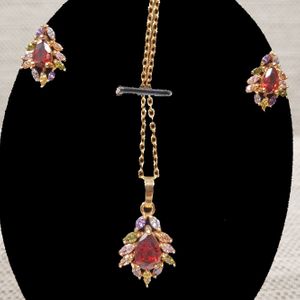 Detailed view of delicate jewelry set with colorful stones