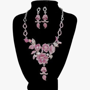Three piece jewelry set with pink stones