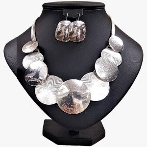 Three piece jewelry set in silver color
