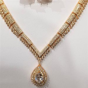 Detailed view of necklace for gold color five piece jewelry set