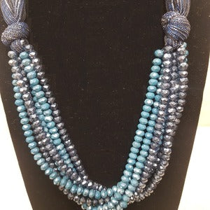 Closer view of multistrand beaded necklace