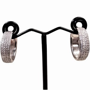 Small sterling silver hoops with stones