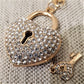 Detailed view of Heart shaped lock and key purse charm
