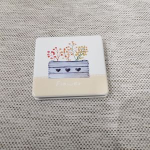 Square shaped pocket mirror when closed