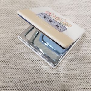 Square shaped pocket mirror when opened