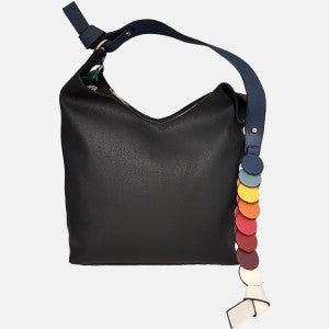 Fashionable handbag in artificial leather
