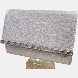 Party purse in silver with clear stone embellishment on the front flap
