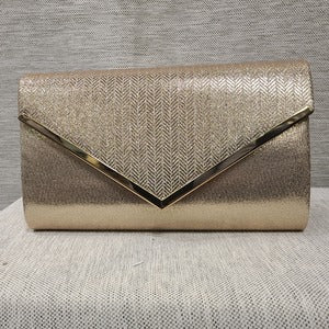 Party purse in dull gold with front flap