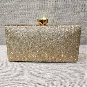 Structured party purse in gold with AB stones
