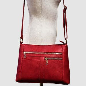 Red side bag with multiple zipper pockets