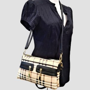 Plaid pattern side bag with black trim and adjustable strap