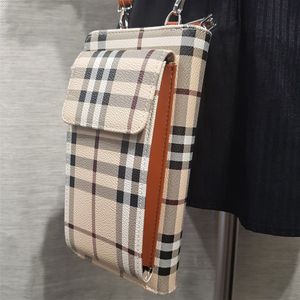 Detailed view of small plaid pattern side bag