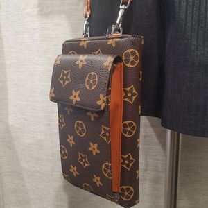 Closer view of brown and tan print small side bag
