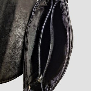 Top inner view of women's leather size bag, center partition