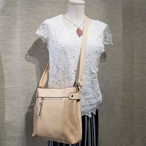 Stylish beige color side bag with adjustable shoulder strap