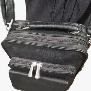 Multiple compartments of black side bag