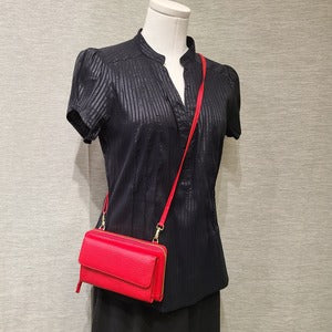 Red color small side bag with adjustable shoulder strap
