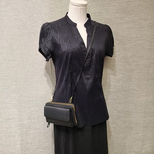 Full view of Black color small side bag with adjustable shoulder strap