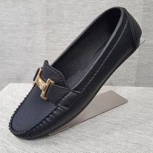 Side view of black color loafer for women