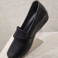 Side view of black shoes with small platform heel 