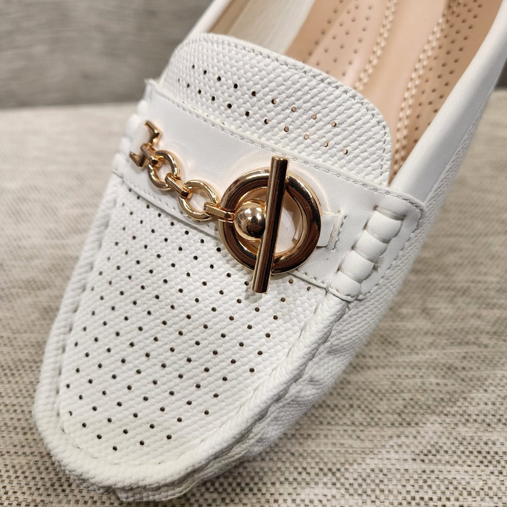Front view of White color flat shoes for women with gold buckle