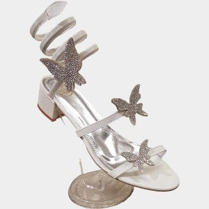 Black heels in white with wrap around ankle