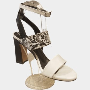 White and black block heels with animal print strap
