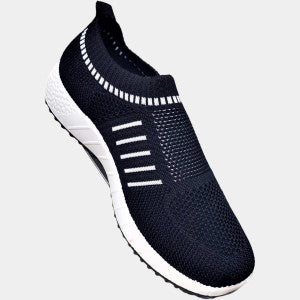 Slip on runners for women in black with white stripes