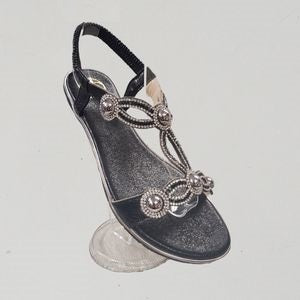 Sling back black summer sandals adorned with studs and stones