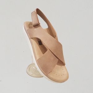 Sling-back summer sandals in dull pink color and platform heels
