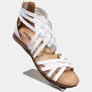 Side view of strappy sandals for women, white upper and comfy sole, and zip closure at the back.