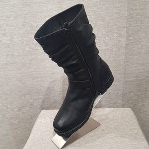 Side view of Black color midcalf length winter boots for women