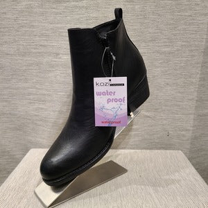 Side view of Ankle boots with short heel