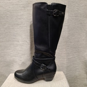 Side view of Long boots with zip closure on the side