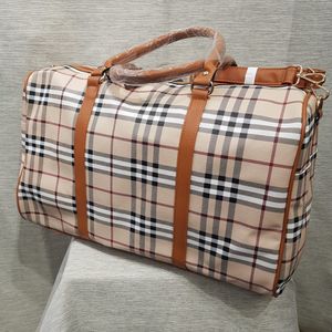 Plaid pattern travel bag with top handle and strap